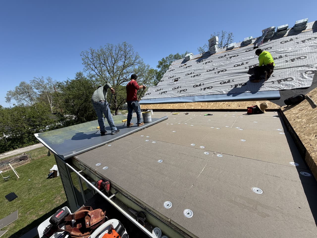 The 5 Star Roofing and Construction crew installing a new roof in Kansas City