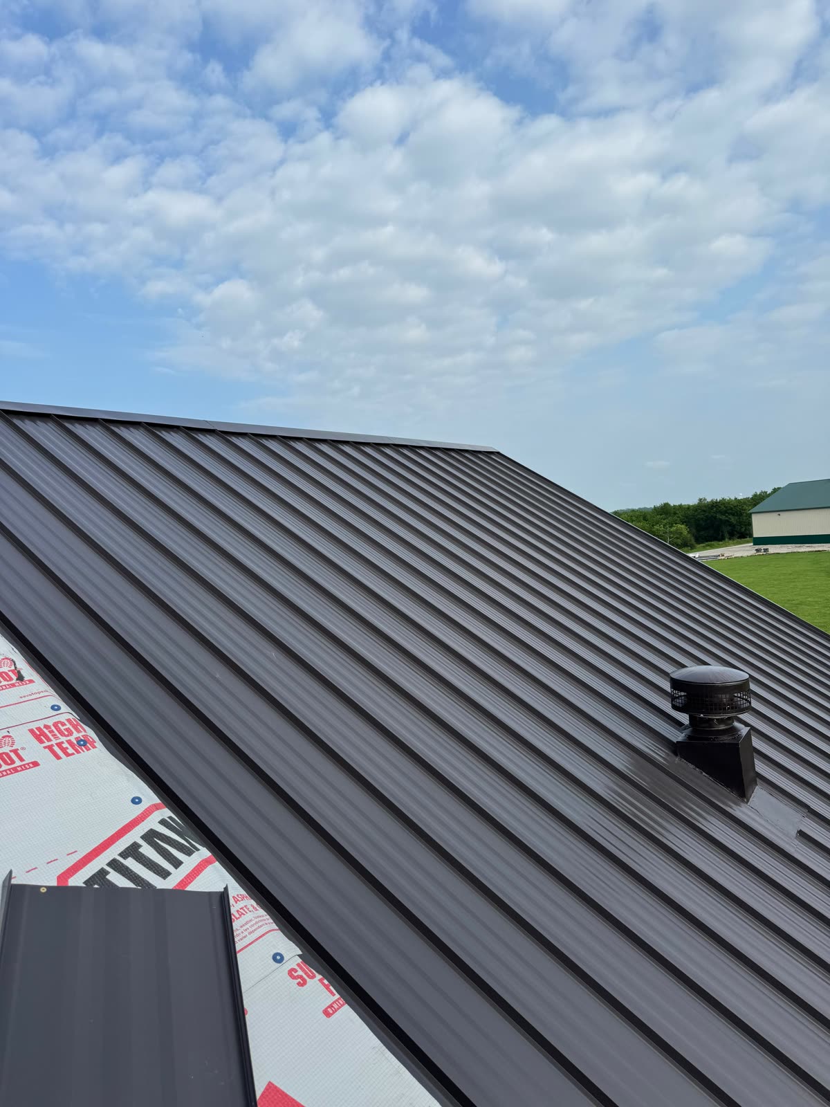 Standing Seam Metal Home in Kansas City Metro by 5 Star Roofing and Construction